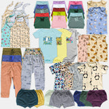 Collection of baby clothes including shirts, pants, and shorts in various colors and patterns on a white background.